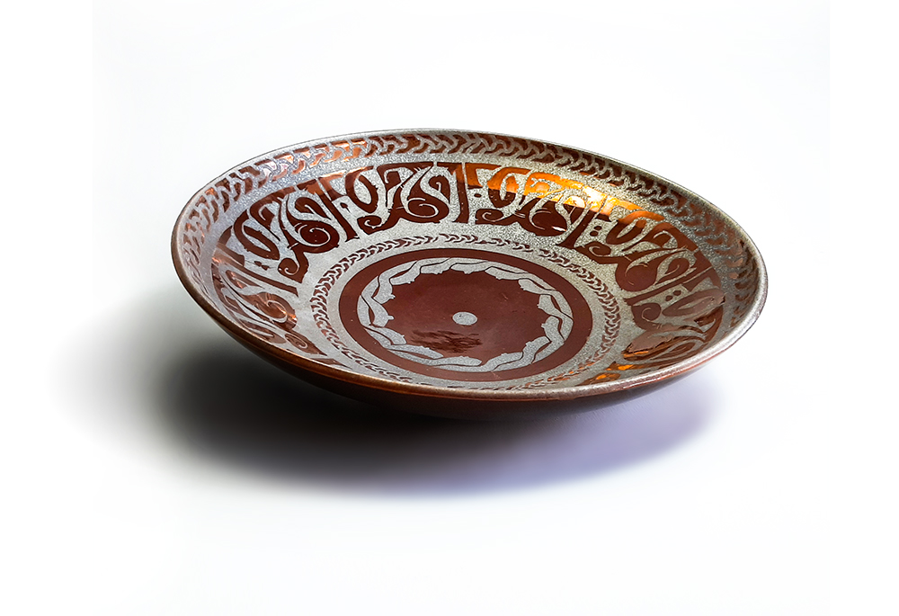 Decorated luster plate from Heritage ballad collection